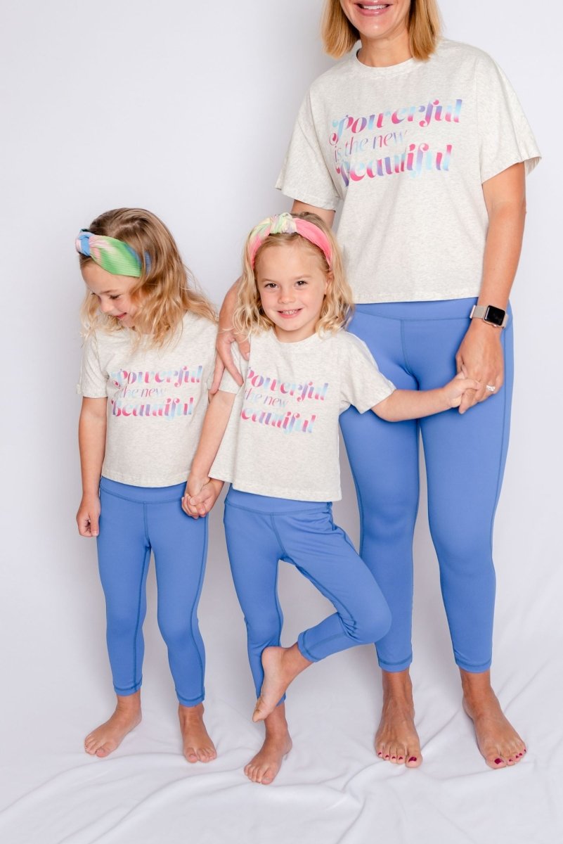 twins and a mom dressed in mommy and me blue athletic leggings