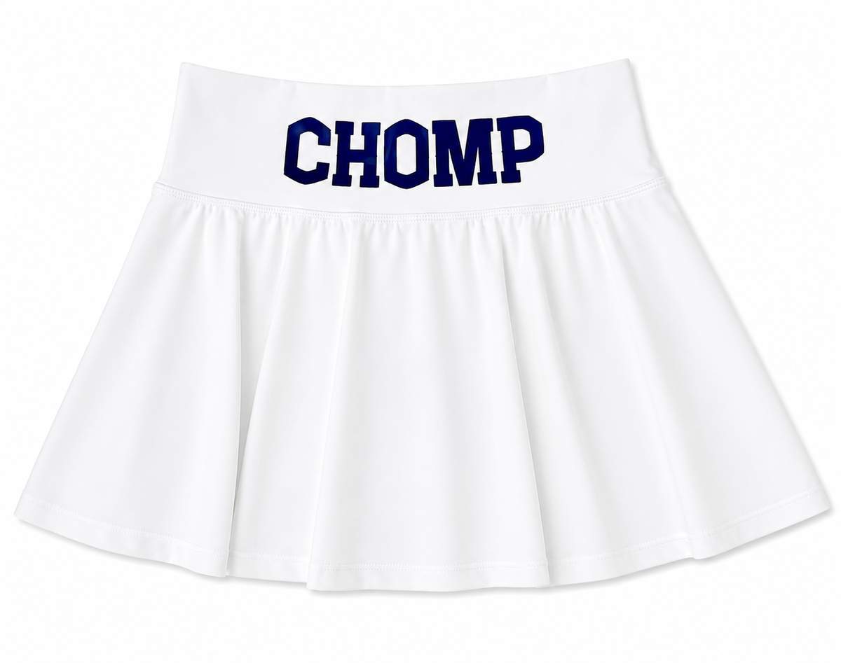 A white pleated cheerleader-style athletic  skirt with the word 'CHOMP' printed across the waistband in dark navy blue block letters, shown on a plain white background. Chomp is a Florida fan phrase. 