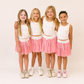 Pink obverlay skirts with bow printed detail 