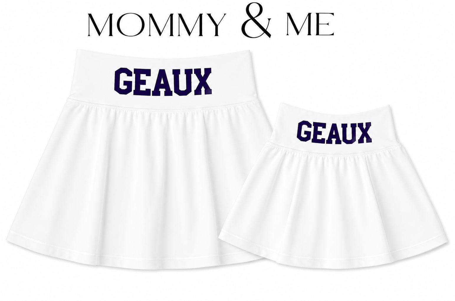 Two white pleated skirts shown on a white background, labeled 'MOMMY & ME' at the top. The larger skirt says 'GEAUX' in dark blue on the waistband, and the smaller skirt says 'GEAUX' as well. A Louisiana Gameday matching skirt set. 